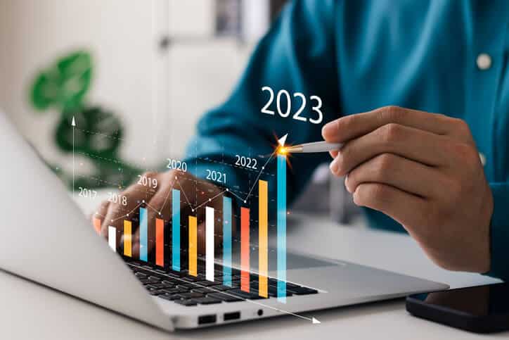 person who has completed digital marketing courses evaluating marketing results