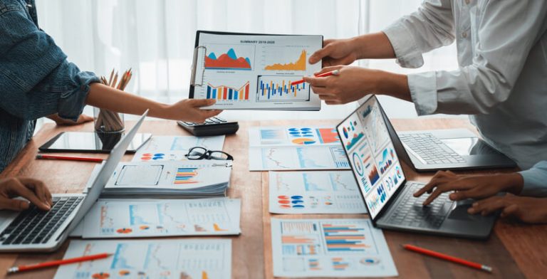 A digital marketing team carrying out a competitive analysis after their digital marketing training