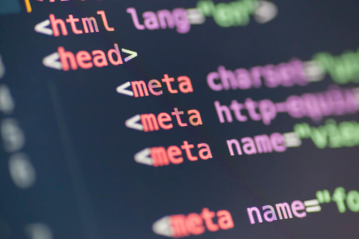 A digital marketing diploma graduate working on meta tags