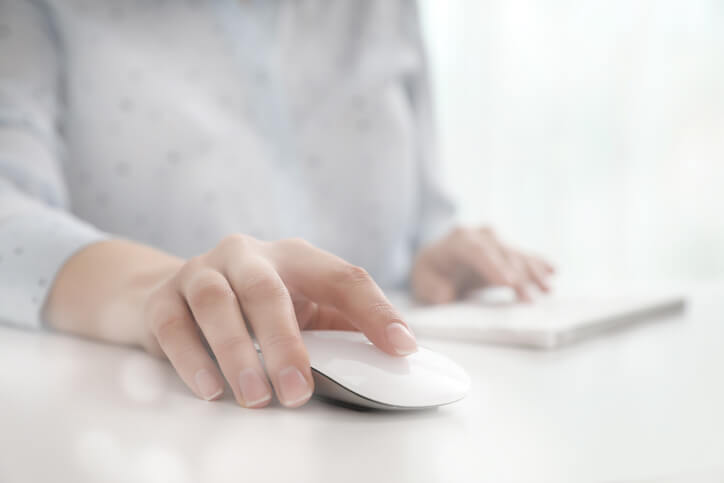 A PPC specialist working on her PC after our digital marketing course