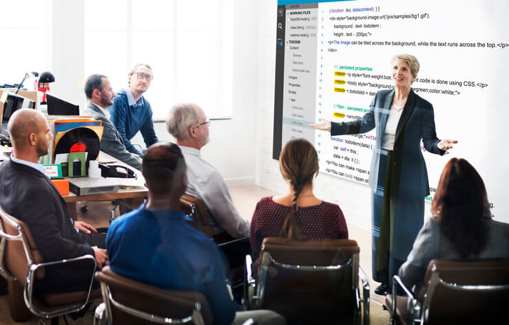 A basic html courses in Vancouver instructor teaching basic HTML to digital marketing students