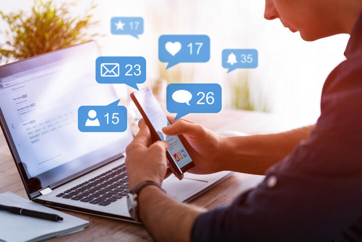 A social media manager engaging followers across platforms, showing community management in action
