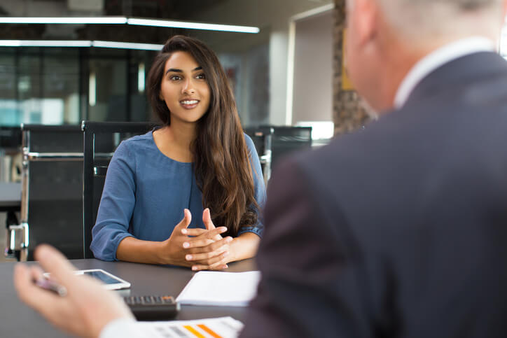 A candidate answering cybersecurity interview questions during a job interview.