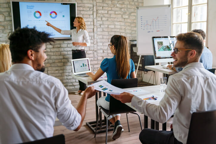 A class of students learning digital marketing and analytics in a classroom setting