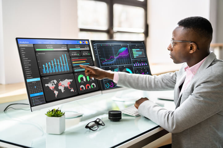 A digital marketer analyzing first-party data insights on a dashboard