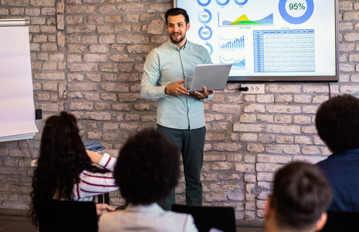 An instructor teaching analytics and data skills for digital marketers