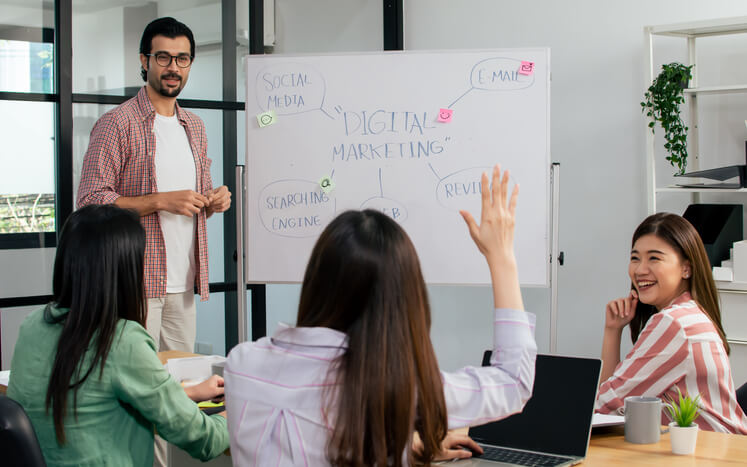 Classroom discussion on social media and SEO techniques at Cumberland College