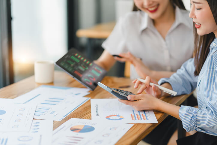 Digital marketing team analyzing campaign data