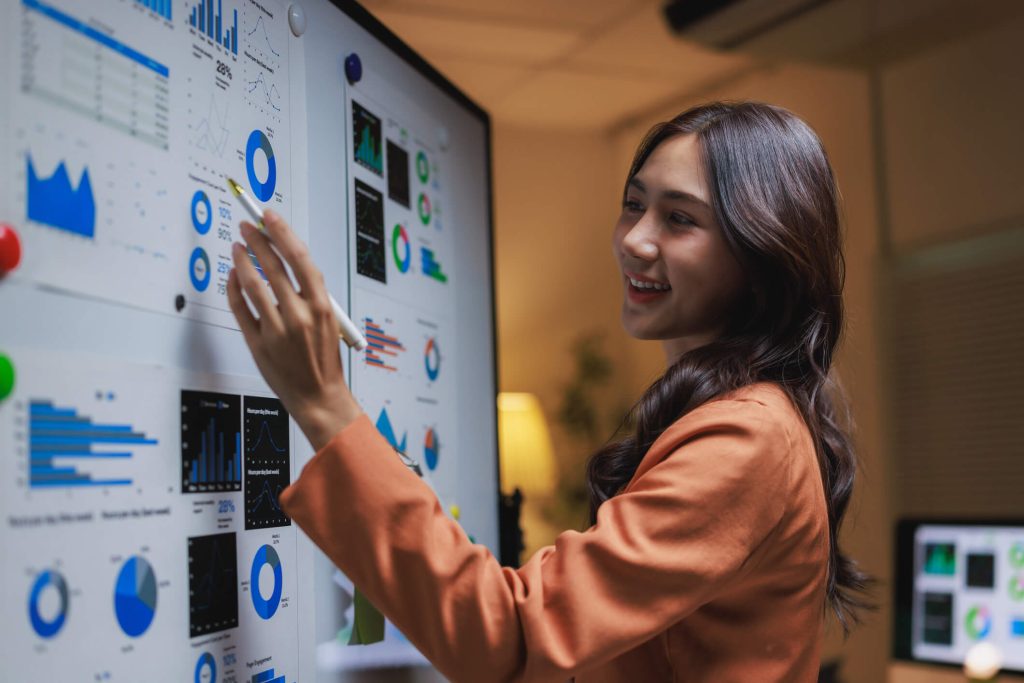 Professional presenting business insights from a data dashboard
