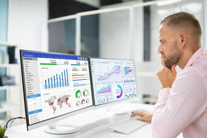 A digital marketer comparing CTV campaign performance and audience metrics