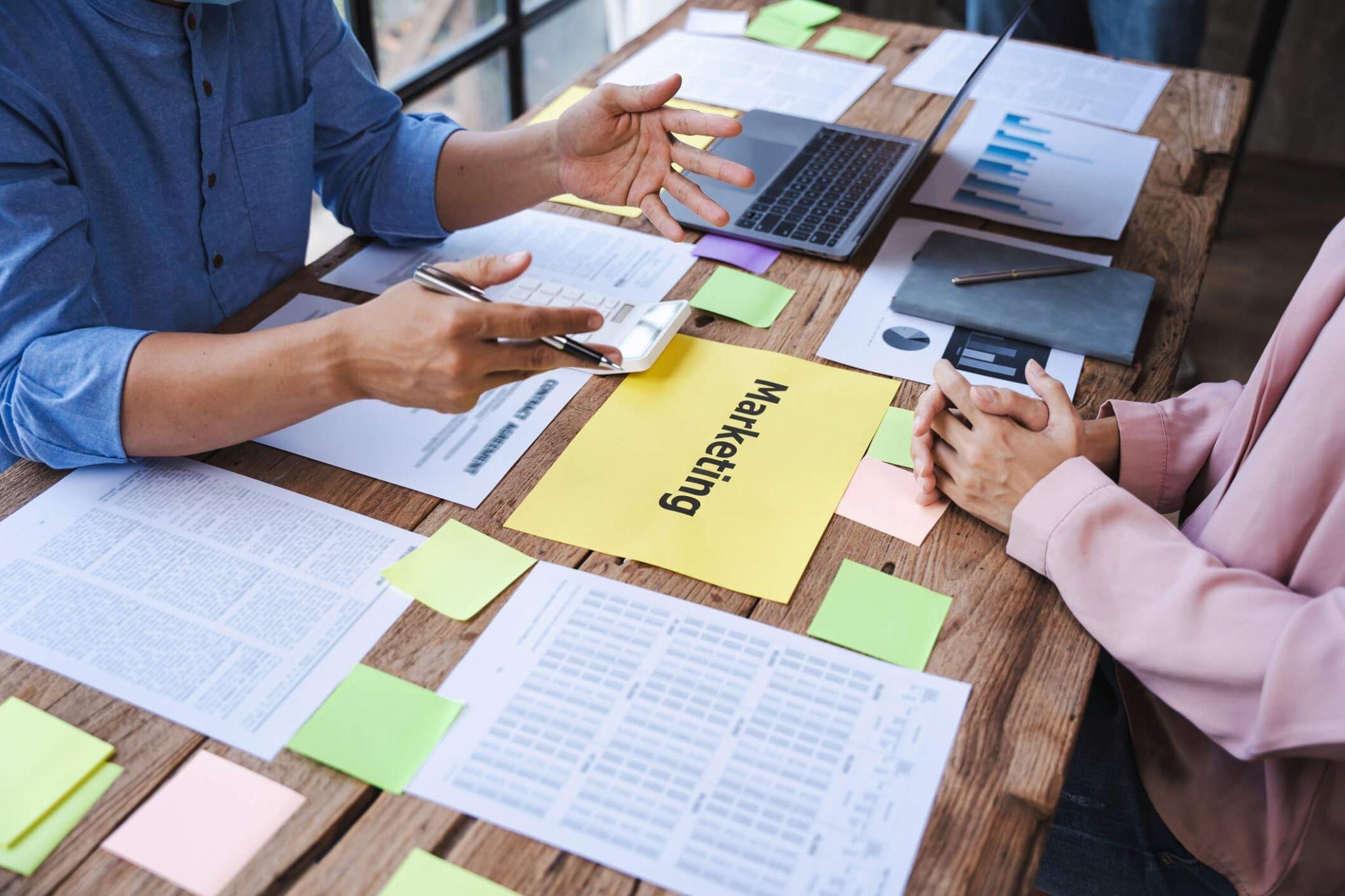A marketing team planning audience, messaging, and campaign deliverables